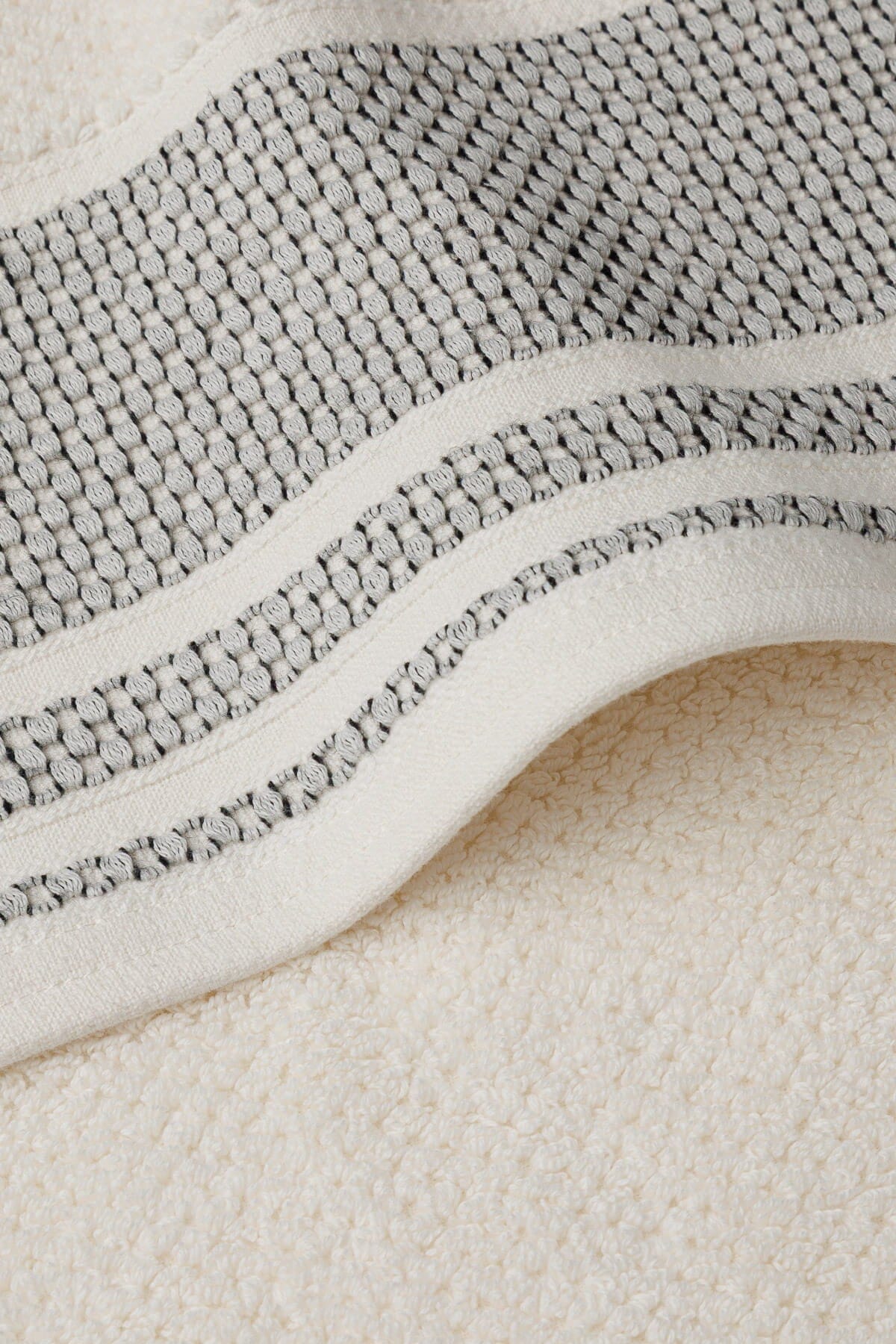 Texere 100% Organic Cotton Rice Weave Towel Set Fishers Finery Cream with Black Boarder 2 Bath Towels Close Up Detail of Fabric and Trim