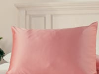 Fishers Finery video of women reading a book on  on a pink Silk Pillowcase on a luxurious bed