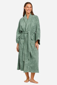 Lily green terry cloth robe with kimono sleeves, waist tie, and front pockets.